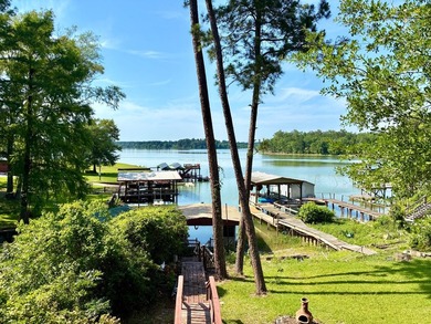 Enjoy lake life at its finest! This waterfront property offers - photo 2
