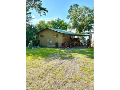 Enjoy lake life at its finest! This waterfront property offers - photo 3