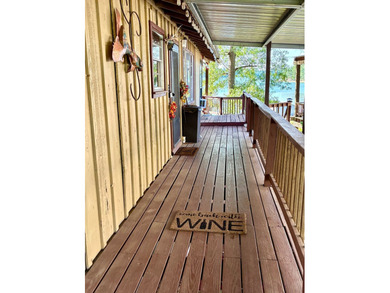 Enjoy lake life at its finest! This waterfront property offers - photo 5