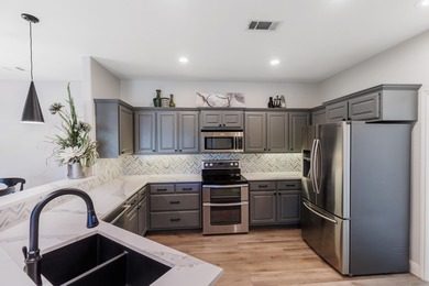 Welcome to this stunning, recently remodeled, waterfront retreat - photo 7