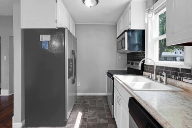 Welcome to this charming 3-bedroom, 2-bath home with a spacious - photo 11