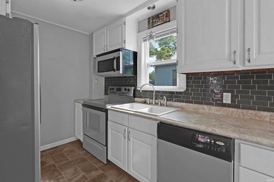 Welcome to this charming 3-bedroom, 2-bath home with a spacious - photo 12