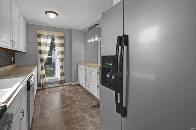Welcome to this charming 3-bedroom, 2-bath home with a spacious - photo 14