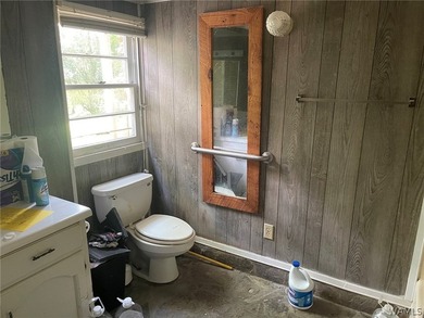Discover this rare historical design home that needs TLC - photo 10