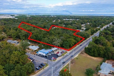 This 3.99-acre parcel presents a rare development opportunity in - photo 1