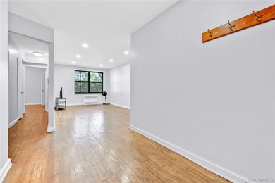Spacious and sunlit, this one-bedroom, one-bathroom co-op in - photo 3