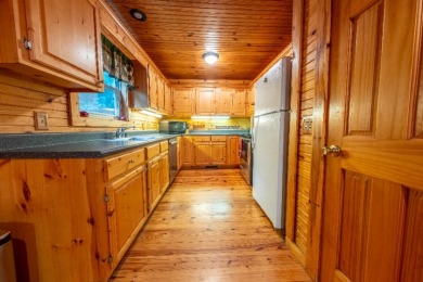 Sleeps 8, Unrestricted, wooded 7.21 acres & a solo private dock - photo 11