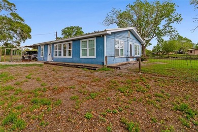 Lakefront retreat on three acres offering rare privacy - photo 11