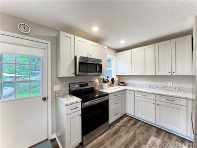 Curated, turnkey, and designed for the ultimate Lake of the - photo 12