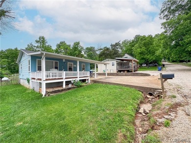 Curated, turnkey, and designed for the ultimate Lake of the - photo 35