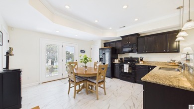 Nestled in the scenic waterfront community Moon Bay , this - photo 13