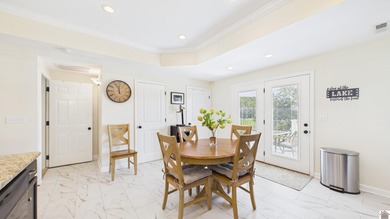 Nestled in the scenic waterfront community Moon Bay , this - photo 21