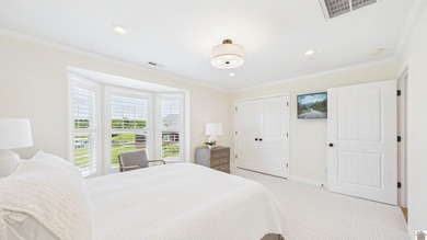 Nestled in the scenic waterfront community Moon Bay , this - photo 34