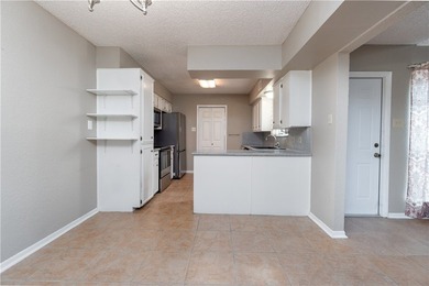 This beautifully renovated 3-bedroom, 2-bath townhouse is - photo 4