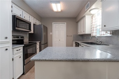 This beautifully renovated 3-bedroom, 2-bath townhouse is - photo 5