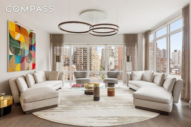 Perched high above the city, this exceptional full-floor - photo 1