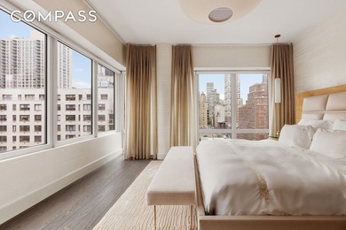 Perched high above the city, this exceptional full-floor - photo 9