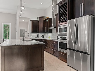 Elegantly designed Custom Home that rivals new construction! - photo 20