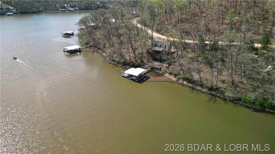 Are you ready to build your dream lake home? This prime piece of - photo 12
