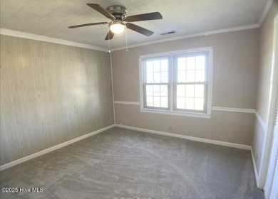Nestled in the charming waterfront town of Belhaven, this - photo 22