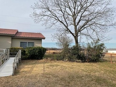 Charming 3 bedroom, 2 bath home situated on approximately .41