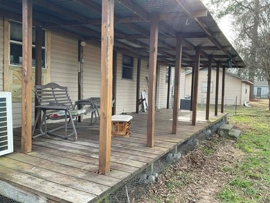 Charming 3 bedroom, 2 bath home situated on approximately .41