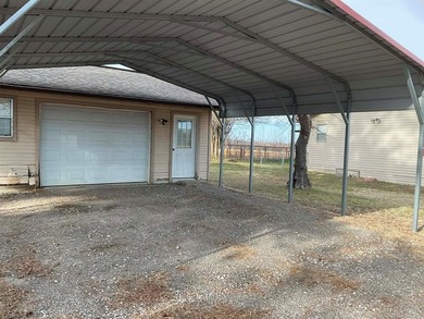 Charming 3 bedroom, 2 bath home situated on approximately .41