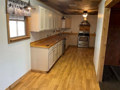 Charming 3 bedroom, 2 bath home situated on approximately .41