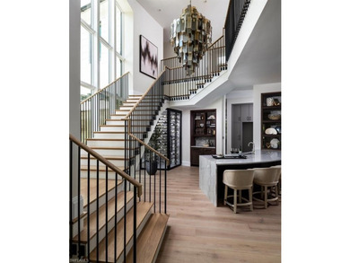 This stunning new construction home in the prestigious Port - photo 8