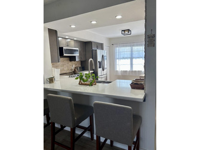 Discover this beautifully renovated 2-bedroom, 2-bathroom condo - photo 24