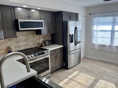Discover this beautifully renovated 2-bedroom, 2-bathroom condo - photo 38