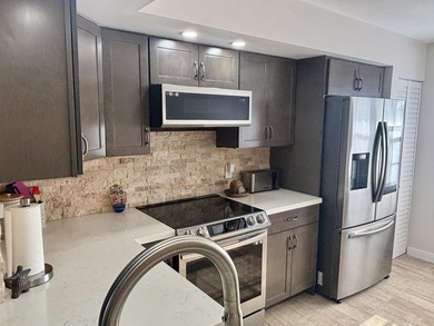 Discover this beautifully renovated 2-bedroom, 2-bathroom condo - photo 40