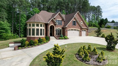 Welcome to 4 Royal Vista Way in River Bend, a premier Lake - photo 1