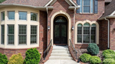 Welcome to 4 Royal Vista Way in River Bend, a premier Lake - photo 2