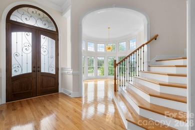 Welcome to 4 Royal Vista Way in River Bend, a premier Lake - photo 3