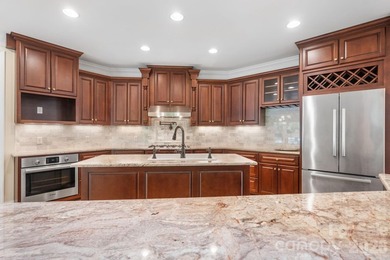 Welcome to 4 Royal Vista Way in River Bend, a premier Lake - photo 8
