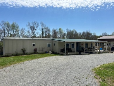 MOBILE HOME W/ ADDITION-STORAGE BLDGS. - NEAR HOLMES BEND MARINA - photo 4