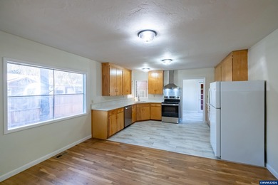 Relax on the porch & enjoy the feel of rural living right on the