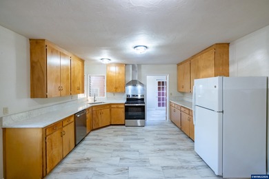 Relax on the porch & enjoy the feel of rural living right on the