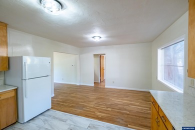 Relax on the porch & enjoy the feel of rural living right on the