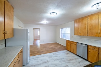 Relax on the porch & enjoy the feel of rural living right on the