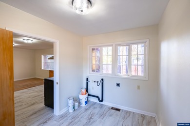 Relax on the porch & enjoy the feel of rural living right on the