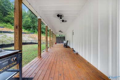 This newer 2023 craftsman style home sits on 16 acres and offers - photo 22