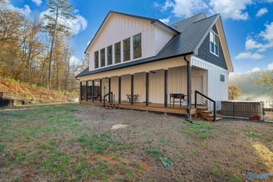 This newer 2023 craftsman style home sits on 16 acres and offers - photo 23