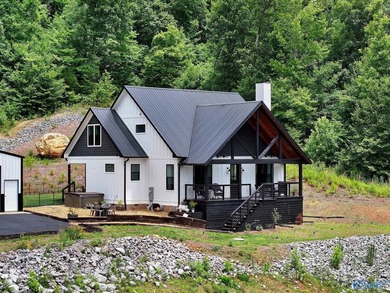 This newer 2023 craftsman style home sits on 16 acres and offers - photo 29