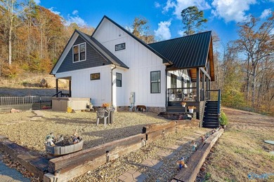 This newer 2023 craftsman style home sits on 16 acres and offers - photo 30