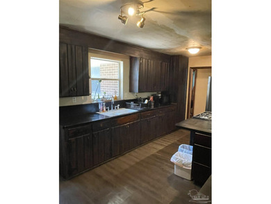 MOTIVATED SELLER! Home has good bones with great potential. Old - photo 10