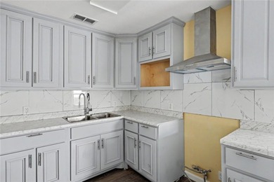 Totally remodeled 3-bedroom,2-bathroom home located in the - photo 4