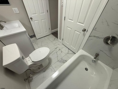 INVESTOR ALERT: Updated 2BR/1BA Condo in Atlantic City! Bright - photo 12