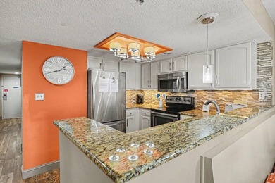 Experience coastal living at its finest in this stunning - photo 11